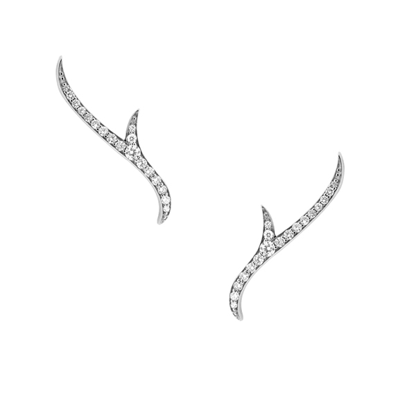 Delicate climbers in gold, diamonds, or with gemstones are great for women of all ages and ear sizes and shapes, says Gizzi. Shown: Diamond ear climbers from Stephen Webster.
